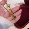 Collar de Calabaza con Piedra Ojo de Tigre y Circonita Bañado en Oro Real, Cadena para Clavícula Estilo Nicho de Lujo Ligero, Joyería Melard para Mujeres con un Toque de Alta Gama