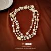 Collar multicapa de perlas ovaladas francesas retro elegante de alto sentido cadena para suéter moda de lujo ligero joyería Joker al por mayor