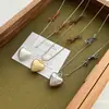 Nova Colar Pingente Coração Tridimensional Retrô Estilo Chinês para Mulheres, Simples, de Nicho, Único, Versátil Corrente Longa para Suéter