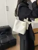 Bolso grande de mujer estilo coreano, nuevo diseño de nicho de moda de Henggeng, elegante bolso de hombro y cruzado, bolso cuadrado pequeño de moda para debajo del brazo