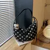 Bolso tipo empanada retro de nicho transfronterizo, nuevo bolso cruzado de moda para mujer Otoño 2026 con lunares, bolso de hombro para el trabajo