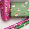 Fabricante en Stock al por Mayor Nuevo Papel Recubierto Brillante de Navidad Divertido e Interesante Papel de Regalo de Papá Noel