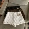 Foto real de ropa de mujer de Dongdaemun, Corea: falda de lunares de cintura alta de alta calidad para verano