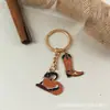 Chaveiro de Cowboy do Velho Oeste Americano Pingente de Liga de Touro Gota de Óleo Chaveiro de Carro Bolsa para Casal Pronta Entrega Atacado
