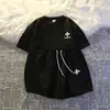 Traje informal de dos piezas para mujer, verano 2025, nuevo, pantalones cortos de manga corta, ropa deportiva holgada y relajada para hombres pequeños.