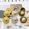 Botón metálico de alta gama para Otoño e Invierno botón dorado hebilla de hongo hebilla de traje hebilla de camisa botón retro moderno estilo Chanel