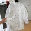 Camisa feminina estilo europeu e americano, com estampa de coração, corte solto, manga longa e colarinho, uma nova coleção primavera/verão, top versátil e estiloso