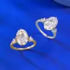 Joias Mu Jing novo anel de prata S925 banhado a ouro com incrustação de diamante de alto carbono corte flor de gelo oval 8*12 anel cruzado venda quente transfronteiriça