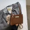 Bolsa Feminina de Luxo 2026 Nova de Inverno Super Popular Pequena Bolsa de Mão para Trabalho Bolsa de Balde Moda Retrô de Ombro Único Transversal