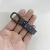 Llavero de aleación de zinc para coche personalidad creativa colgante de llave para colgar en la cintura de hombre hebilla de perro mosquetón fabricantes venta al por mayor