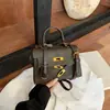Bolsa de mão de design minimalista de nicho transfronteiriça, bolsa quadrada pequena da moda feminina, bolsa tira-colo para o dia a dia Kelly
