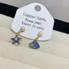 Brincos de Pérola de Água Doce e Concha de Estrela do Mar Assimétricos de Alto Padrão Blue Ocean para Mulheres Brincos de Menina Doce