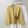 Cardigan Elegante de Tricô Curto Cor de Damasco com Botão de Borboleta Estilo Chanel para Mulheres, Novo Versátil para a Primavera de 2026