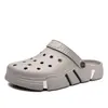 Zapatos con agujeros sandalias pantuflas de hombre talla grande pantuflas para exteriores pantuflas de viaje de ocio al aire libre de doble uso zapatos de playa venta al por mayor