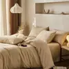 Estilo Novo 2025 Algodão de Fibra Longa 60s Jacquard Escovado Conjunto de Quatro Peças Luxo Leve Padrão Escuro Tridimensional Roupa de Cama 100% Algodão