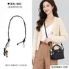 Solo se vende la bolsa interior - la bolsa exterior no está incluidaBolsa mini tipo dumpling Longchamp, Papel Dupont Longchamp