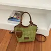 Bolsa tote tipo balde, simples e estilosa, coleção outono 2026, uma bolsa de ombro chique e descontraída para o trabalho e o dia a dia.
