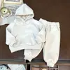 Conjunto personalizado de polar con capucha para niños, nuevo producto de invierno 2025, tops y pantalones casuales de moda para niños y niñas, conjunto de dos piezas estilo coreano