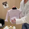 Camiseta Base de Manga Larga para Niñas de Primavera y Otoño con Cuello Volante Lazo para Bebé Top de Media Altura Ropa Infantil Venta al por Mayor
