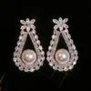 Pendientes Cruzados Transfronterizos Europeos y Americanos de Flor de Zirconia y Botón de Perla de Cobre Vintage, Pendientes Versátiles de Moda de Lujo Ligero de Gama Alta