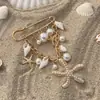 Broche Colgante de Concha y Estrella de Mar Estilo Vacaciones de Playa Transfronterizas Europeas y Americanas, Elegante Pin Multifuncional de Perlas de Imitación
