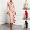 Enviado 2026 Sitio independiente transfronterizo europeo y americano wish Vestido simple de color liso con cuello en V y manga larga con volantes