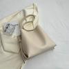 Bolso pequeño y sencillo popular de este año para mujer, bolso tipo cubo de nueva moda de primavera 2023, bolso de hombro pequeño de alta gama de moda