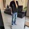 Nuevos jeans de marca de moda con parche de cuero de llama cruzada lavada para hombre, moda versátil casual de pierna recta holgada de la calle