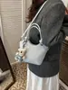Bolsos de Moda Transfronterizos para Mujer 2026 Primavera Nueva Moda Bolso de Hombro Cruzado Bolso de Mano Estilo Coreano Casual Bolso Cubo