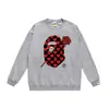 Otoño e invierno estilo japonés marca de moda cabeza de simio estampado de dibujos animados unisex joven suéter sudadera holgada venta al por mayor y dropshipping