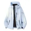 Traje de asalto para exteriores color camello mismo estilo tres en uno para mujer cortavientos impermeable forro de plumón carcasa rígida chaqueta de ropa de montañismo hombre
