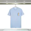 Camiseta de manga corta con cuello redondo distintivo y estampado de letras Dreamland Door, de Foreign Trade New Casablanca