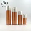 Fundo com Padrão Garrafa Redonda Garrafa Acrílica Laranja Frasco com Bomba para Loção Essência Frasco para Creme Material de Embalagem para Conjunto Cosmético