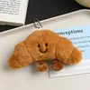 Pingente de Croissant de Pelúcia Desenho Animado Baguete Boneco Chaveiro Casal Fofo Decoração de Bolsa Acessórios Venda por Atacado