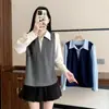 Nova Camisa Feminina Plus Size Primavera 2026 Falsa Duas Peças Color Block Redutora de Idade Manga Longa Camada Superior Afinando