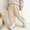 Pantalones casuales para niños, nuevos estilos de primavera y otoño, ropa infantil estilo coreano, cintura elástica, pantalones largos, color liso, corte holgado
