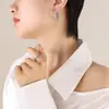 Temperamento europeu e americano tendência criativa única brincos trançados em forma de C moda feminina versátil estilo hot girl acessórios de rua