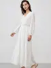 Vestido de Manga Lanterna Suave Estilo Francês Es 2026 Primavera Decote V Comprimento Médio Estilo Fada Fluido Linha A