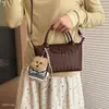 Bolso cruzado tejido de diseño de nicho nuevo 2026, bolso de mano versátil casual para mujer, estilo albóndiga