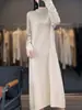 Vestido de Punto de Lana 100% Elegante, Holgado y Adelgazante para el Trabajo, con Cuello Alto Bordado y Botones, Nuevo para Otoño Temprano 2026