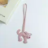 Colgante de Perro de Dibujos Animados Huayang Llavero de Perro con Ojos Grandes y Espalda Arqueada de Piel Sintética Llavero de Cuero Colgante para Bolso Accesorios para Ropa