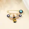 Broche Creativo Sencillo Pin Ojo del Diablo Europeo y Americano Elemento de Escarabajo Abeja Lazo Pin Ojo Azul