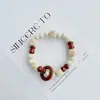 Pulsera de Cerámica Jingdezhen Nueva Historieta China Pulsera Boutique Venta al por Mayor Estudiante Joker Explosiones Puesto del Mercado Nocturno Pulsera