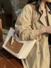 Bolso Tote de Gran Capacidad de Alta Gama de Moda para Mujer 2025 Nuevo Modelo Textura de Viajero Bolso de Hombro Bolso Cubo de Comercio Exterior Transfronterizo