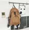 Mochila xadrez casual moderna e estilosa de grande capacidade para estudantes homens e mulheres, mochila leve e estilosa para viagens ao ar livre