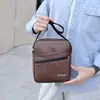 Bolso de hombre transfronterizo, piel sintética PU, estilo coreano, nuevo bolso de hombro, bolso cuadrado pequeño para commuting business casual, gran capacidad, bolso cruzado versátil