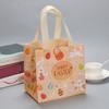 Bolsa de compras ecológica no tejida recubierta de Amazon transfronteriza, bolso de mano de regalo de Pascua con forma de huevo de conejo colorido, venta al por mayor