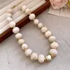 Collar de doble capa con cuentas acrílicas transfronterizo europeo y americano, cadena para la clavícula de lujo ligero de alta gama, joyería de estilo étnico vintage al por mayor