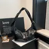 Transfronterizo Otoño 2026 Nuevo Bolso de Mano Retro de Nicho para Mujer Bolso de Hombro Cruzado Bolso de Empanada Elegante de Alta Gama