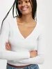 Camiseta de manga larga ajustada de color liso con cuello en V, jersey para mujer, de otoño, nueva, transfronteriza de Amazon Europa y América, con botones en la espalda, para mostrar el ombligo